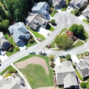 Aerial view of a neighborhood several houses by roof installation company in Gainesville, GA